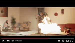 The torching of a vegan expat's home in the ad has drawn flak.